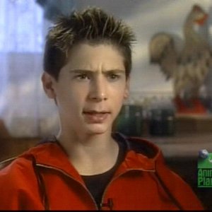 Justin Berfield with his pets in 'Hollywood Unleashed', 2002