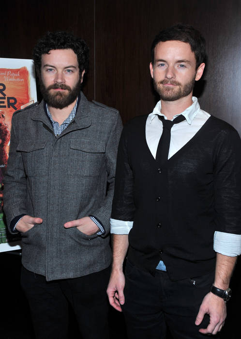 Chris and Danny Masterson at a premiere in 2009
