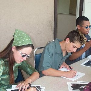 Justin Berfield signing pictures at some event in 2003