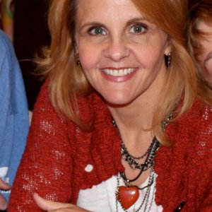 Julie Glaze Houlihan - Malcolm's music supervisor