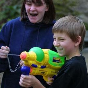 Erik Per Sullivan playing with his Nerf Bazooka