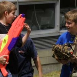 Erik Per Sullivan playing with his Nerf Bazooka