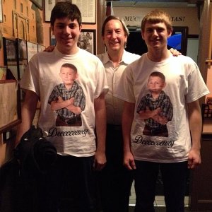 Erik's father at The Alamo restaurant with customers wearing Dewey T-shirts
