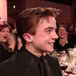 Bryan Cranston, Gail Berman and Frankie Muniz at the Golden Globe Awards (2