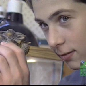 Justin Berfield with his pets in 'Hollywood Unleashed', 2002