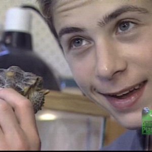 Justin Berfield with his pets in 'Hollywood Unleashed', 2002