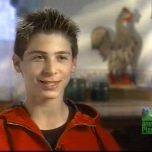 Justin Berfield with his pets in 'Hollywood Unleashed', 2002