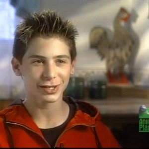 Justin Berfield with his pets in 'Hollywood Unleashed', 2002